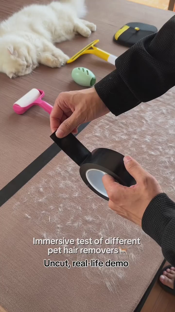 Cat grooming glove in use on furniture